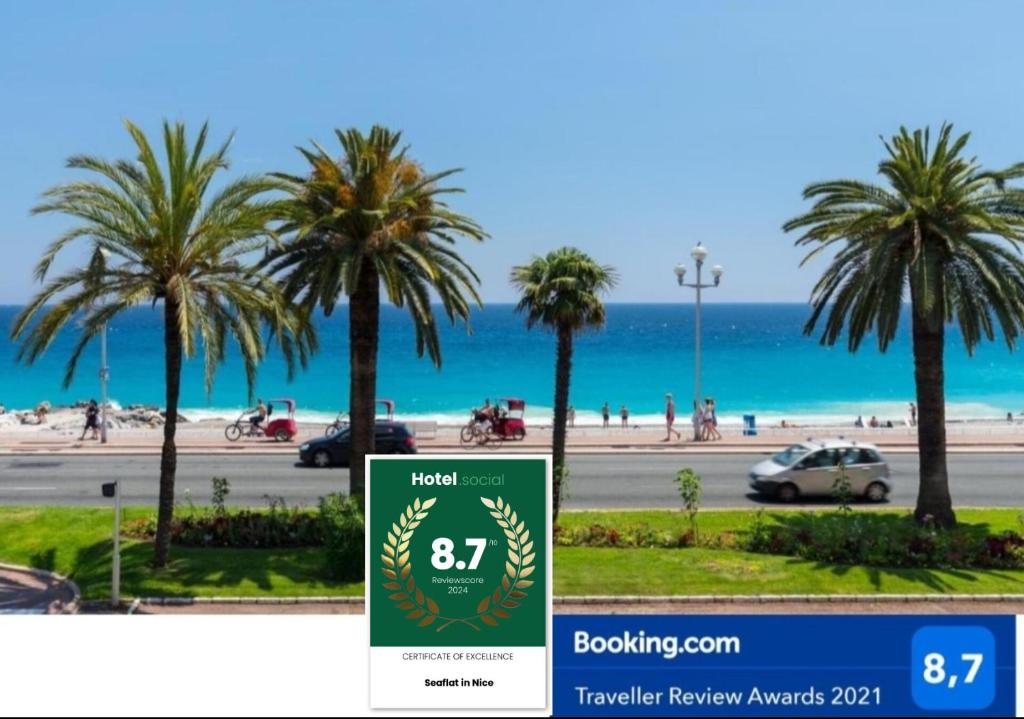 un cartel para un hotel con palmeras y la playa en Seaflat in Nice, en Niza