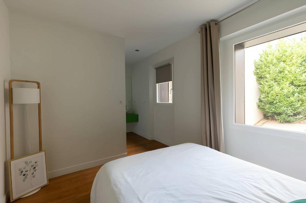 Posteľ alebo postele v izbe v ubytovaní Villa Isaac - Luxueuse - Parking - 16p - Rêve au Mans