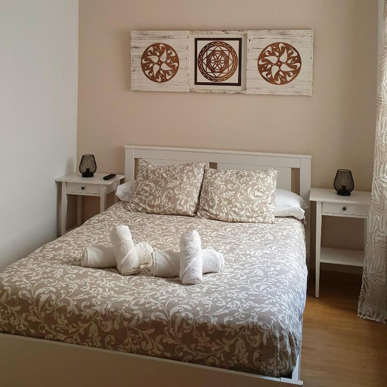 Postel nebo postele na pokoji v ubytování ZUBICALM