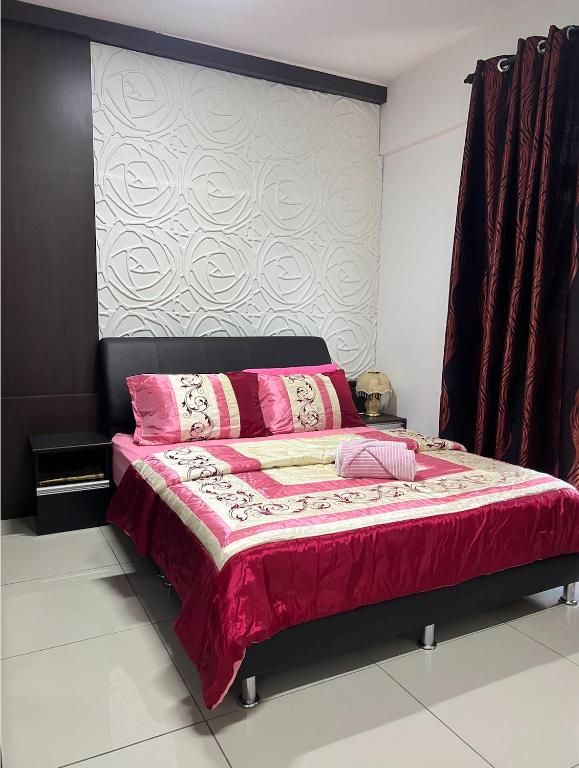 Postel nebo postele na pokoji v ubytování KBCC Service Apartment Homestay