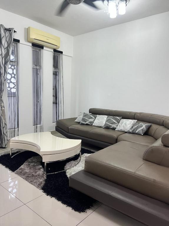 Posezení v ubytování KBCC Service Apartment Homestay