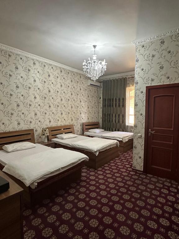Postel nebo postele na pokoji v ubytování Hello Dushanbe Guest House