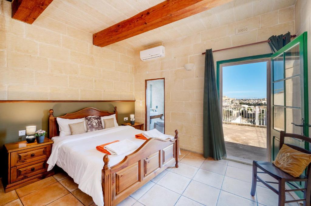 Postel nebo postele na pokoji v ubytování Ta Kalang Holiday Home