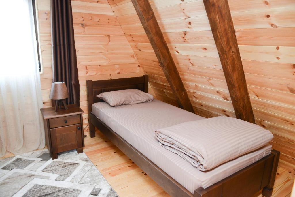 Postel nebo postele na pokoji v ubytování Lux Villas Zabljak