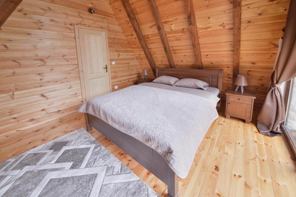 Postel nebo postele na pokoji v ubytování Lux Villas Zabljak