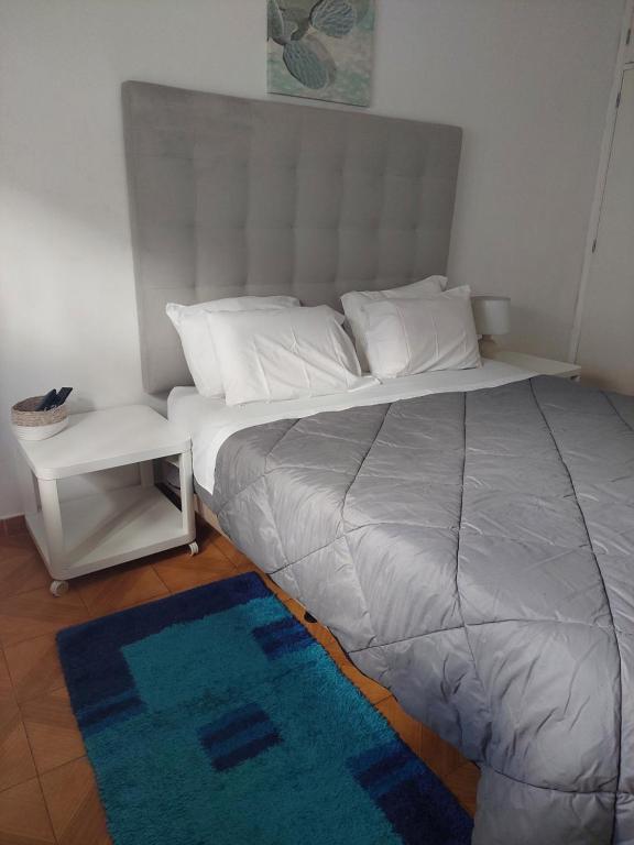 Letto o letti in una camera di Vivenda Rosa Lagos