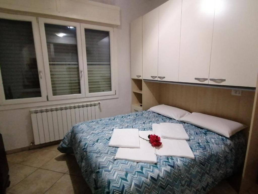 Posteľ alebo postele v izbe v ubytovaní Villa Glori affitto camere monolocali