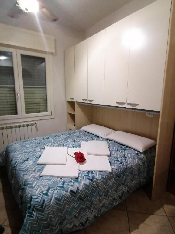 Posteľ alebo postele v izbe v ubytovaní Villa Glori affitto camere monolocali