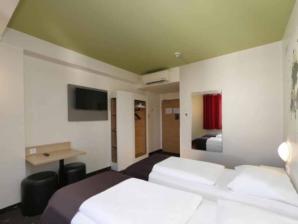 Postel nebo postele na pokoji v ubytování B&B HOTEL Berlin-Potsdamer Platz
