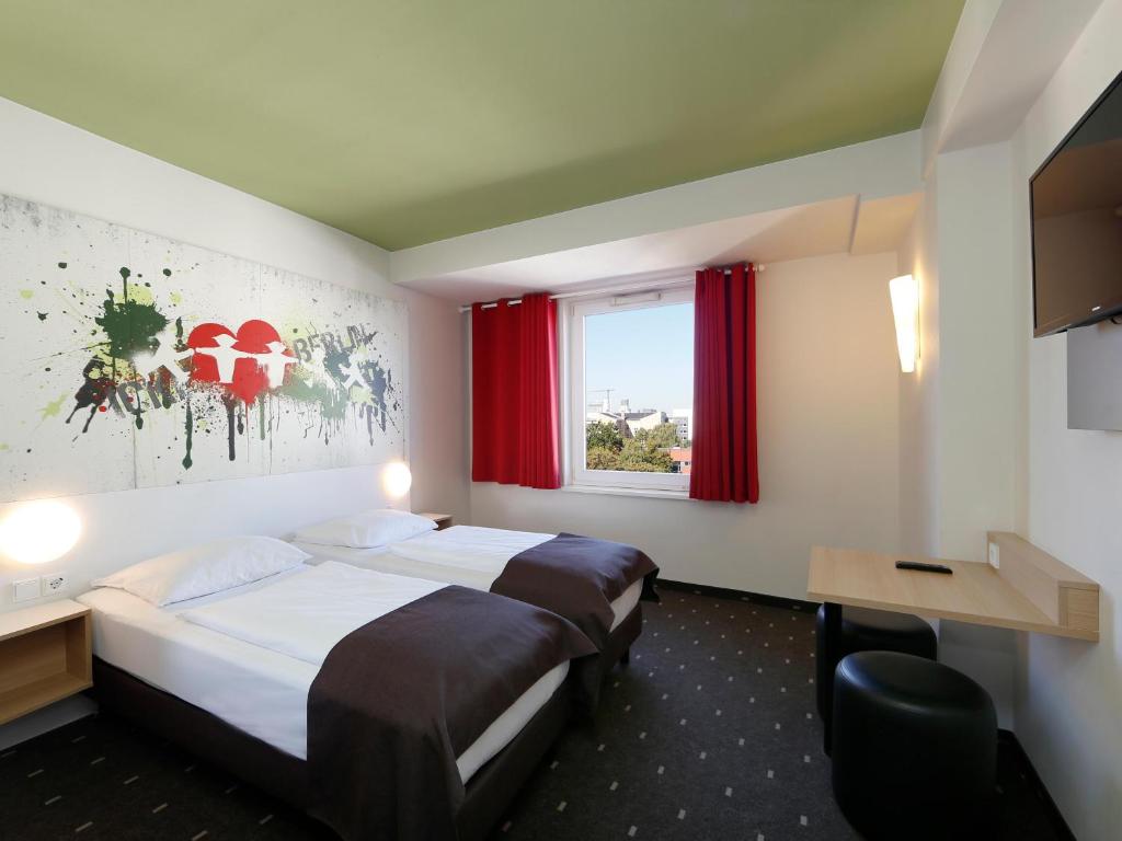Postel nebo postele na pokoji v ubytování B&B HOTEL Berlin-Potsdamer Platz
