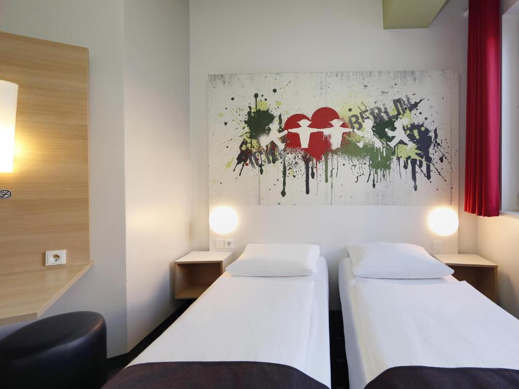 Postel nebo postele na pokoji v ubytování B&B HOTEL Berlin-Potsdamer Platz