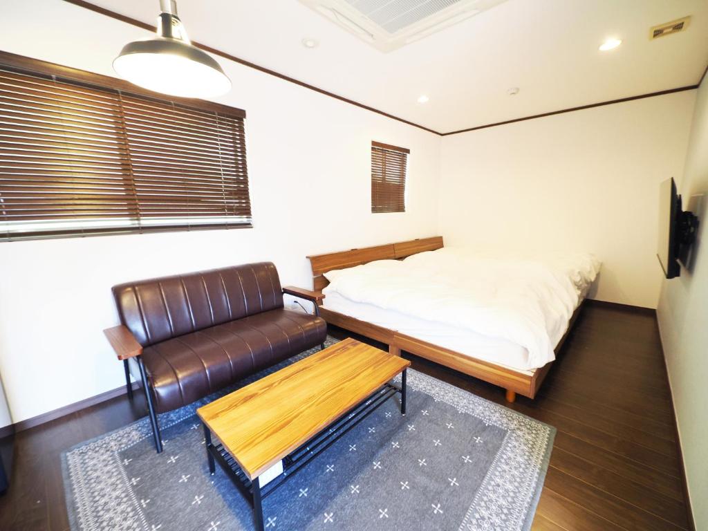 locona +rakuta - Chambre Quadruple Avec Salle De Bain Privée