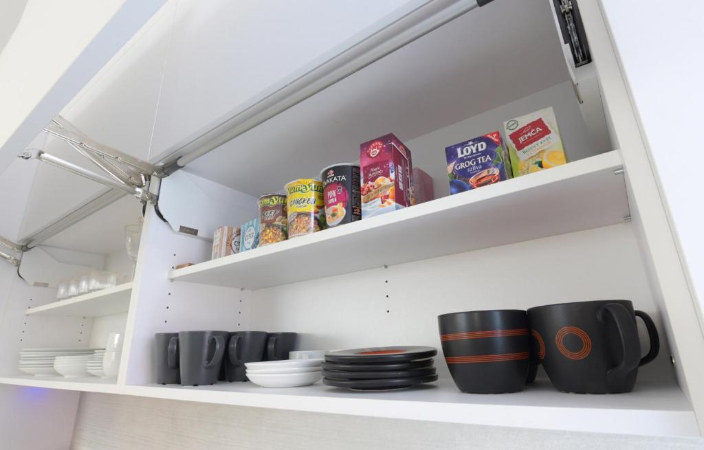Příslušenství pro přípravu čaje a kávy v ubytování Studiový apartmán Tulum