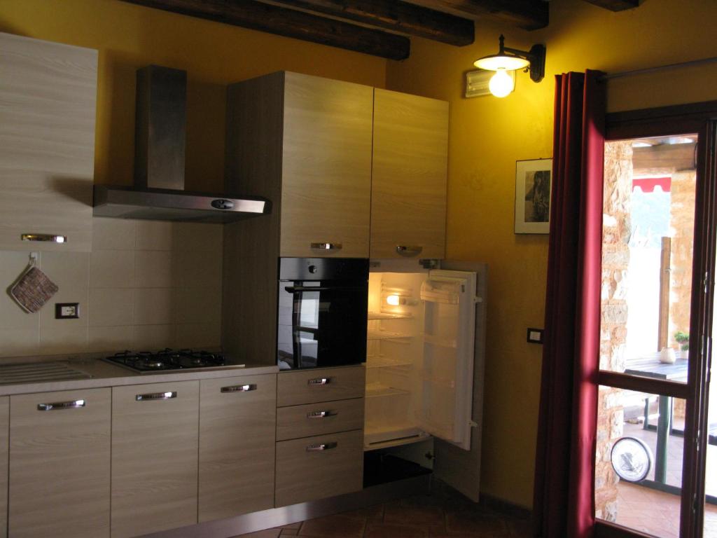 Kuchyň nebo kuchyňský kout v ubytování Chalet della Rota