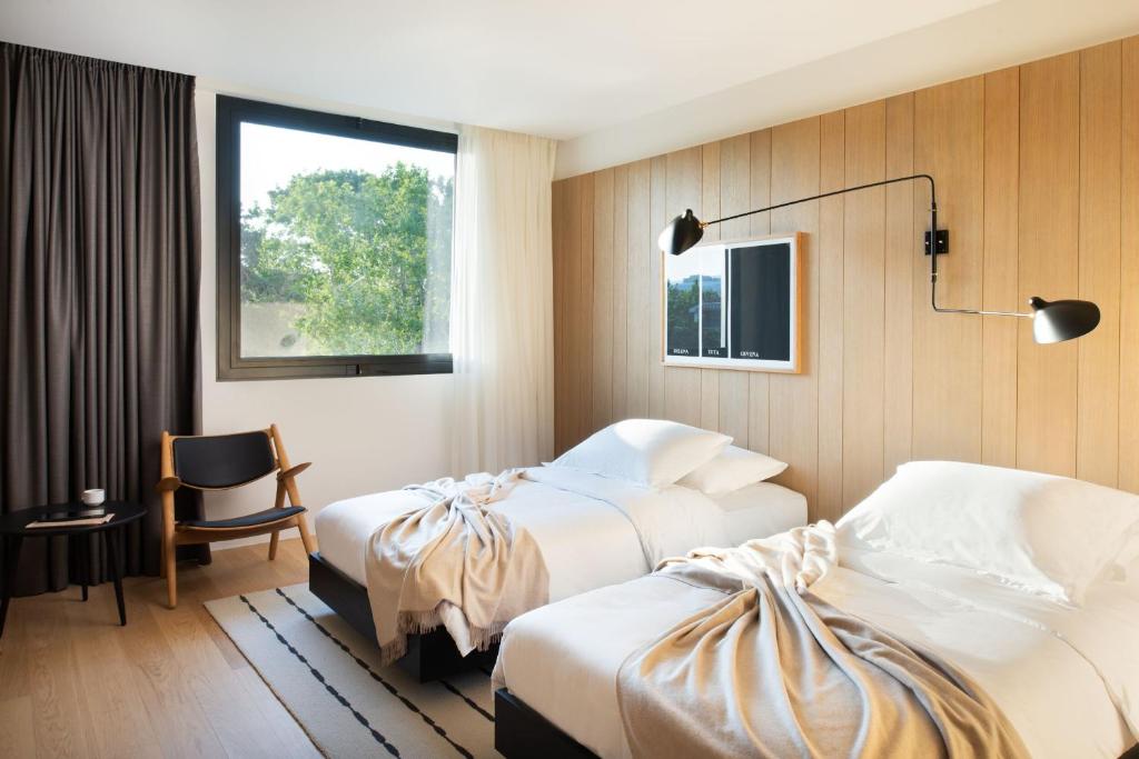 Posteľ alebo postele v izbe v ubytovaní briig boutique hotel