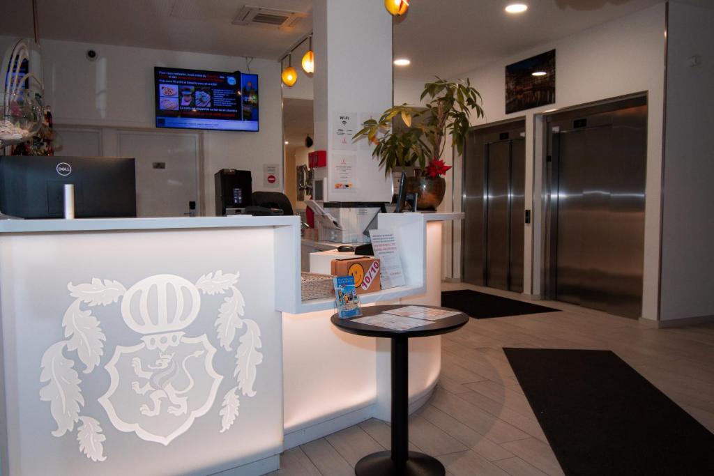 TV a/nebo společenská místnost v ubytování K Hotel