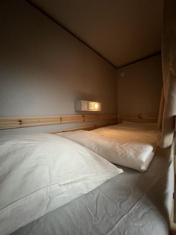 Postel nebo postele na pokoji v ubytování WOW HOME