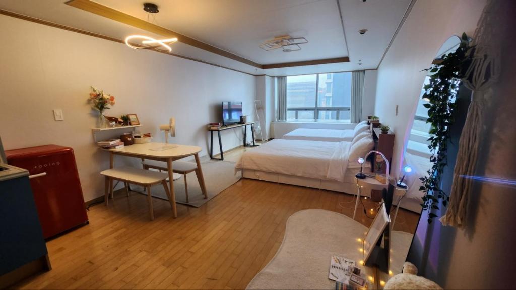 Cama ou camas em um quarto em Posh_HongDae