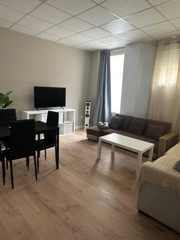 Зона вітальні в Apartamento Valencia 17