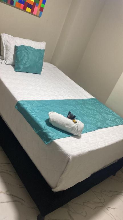 Postel nebo postele na pokoji v ubytování HOTEL LUXEM
