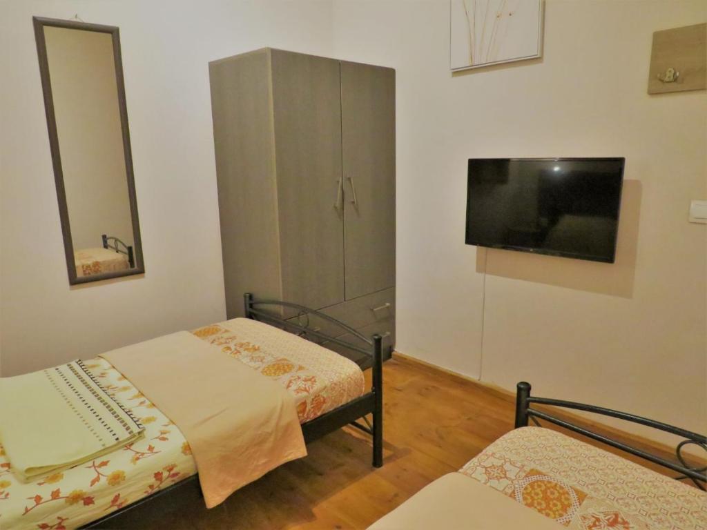 Postel nebo postele na pokoji v ubytování Kenny's Villa