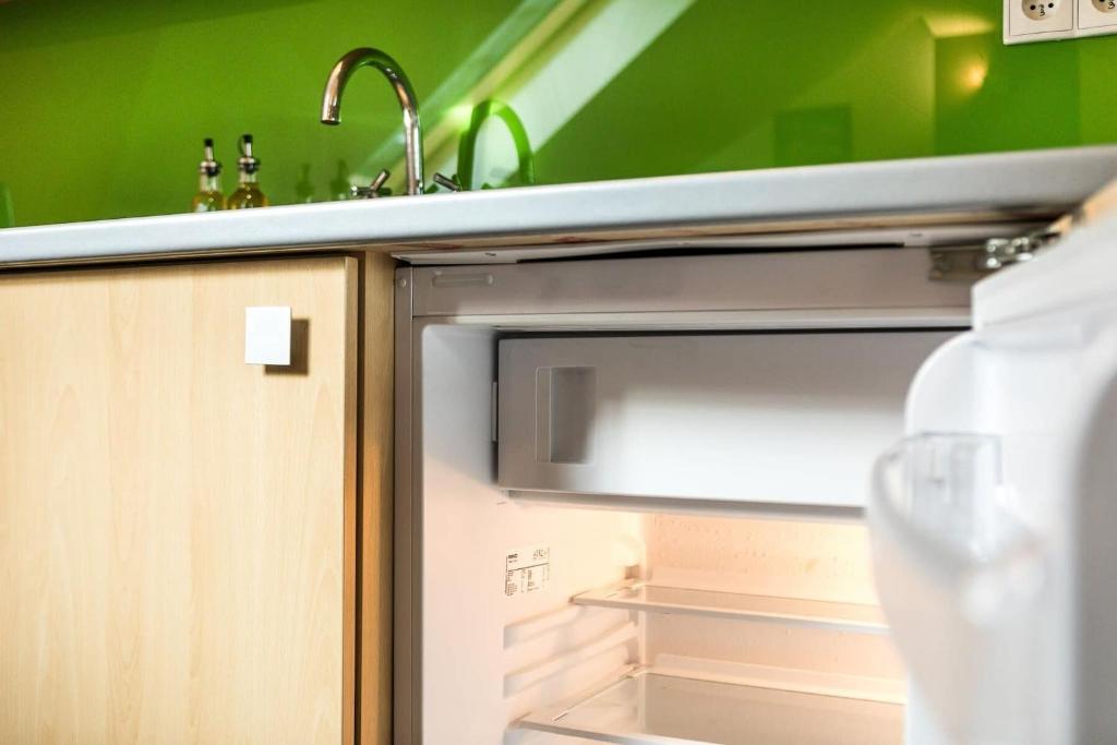 Kuchyňa alebo kuchynka v ubytovaní Rent like home - Strzelców 30C