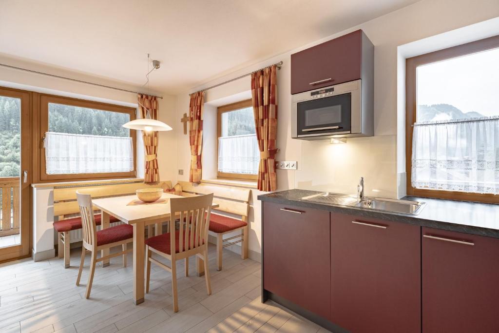 Kuchyňa alebo kuchynka v ubytovaní Apartments Soval