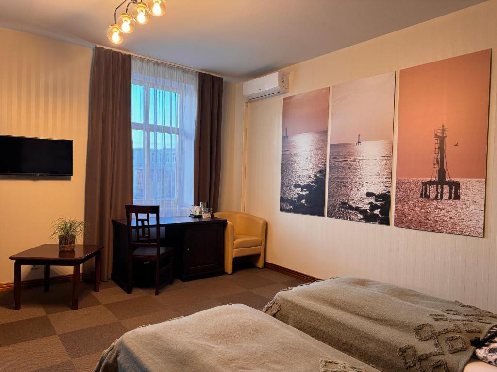 Postel nebo postele na pokoji v ubytování Hotel Vilhelmine