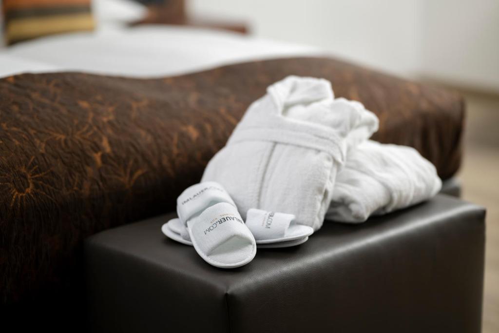 Postel nebo postele na pokoji v ubytování Hotel IMLAUER Wien
