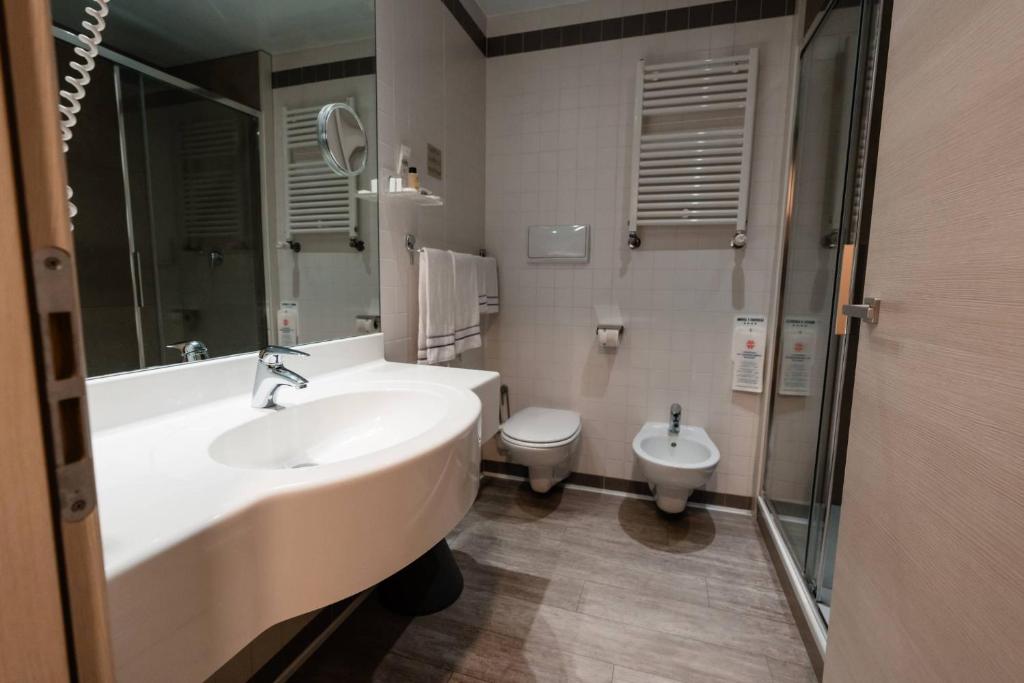 Koupelna v ubytování Hotel Ristorante I Castelli