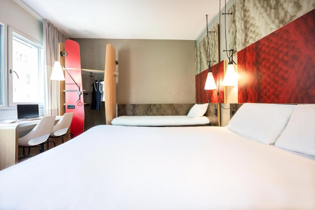 Postel nebo postele na pokoji v ubytování ibis Genève Centre Gare