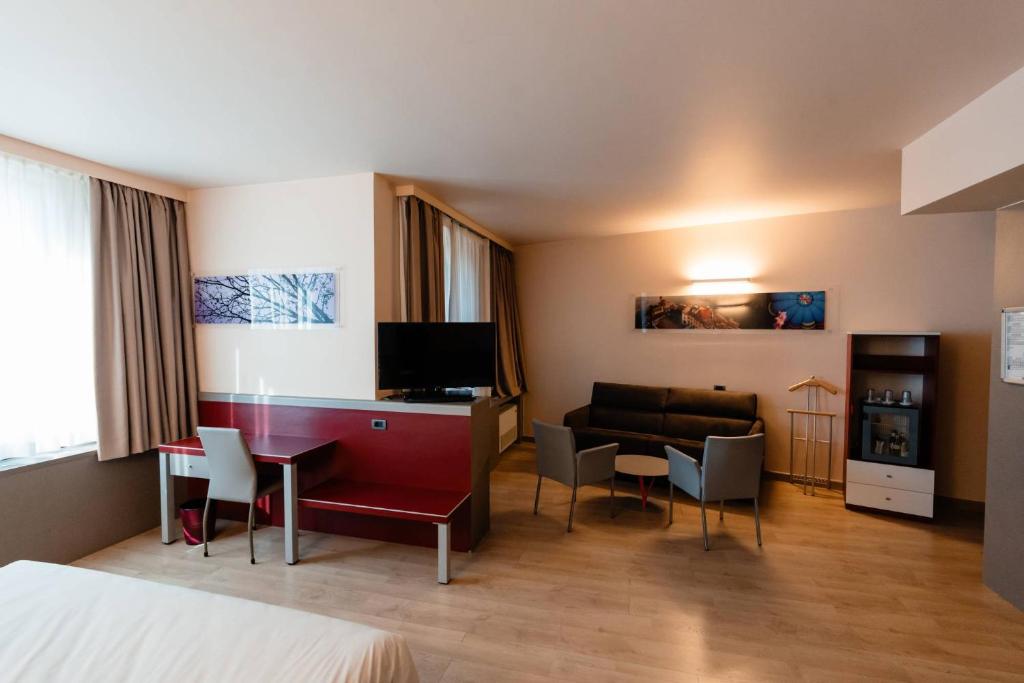 TV a/nebo společenská místnost v ubytování Hotel Ristorante I Castelli