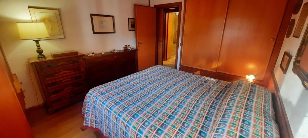 Posteľ alebo postele v izbe v ubytovaní Appartamento di Montagna - Residence 'La Ginestra'