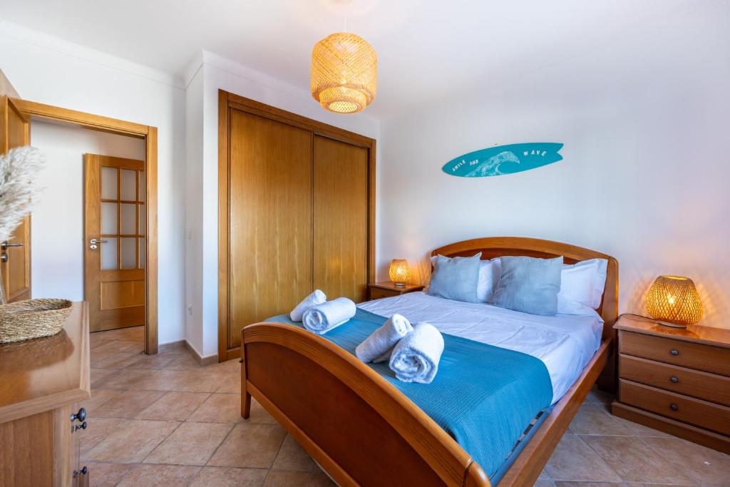 Postel nebo postele na pokoji v ubytování Casa Monkey Business