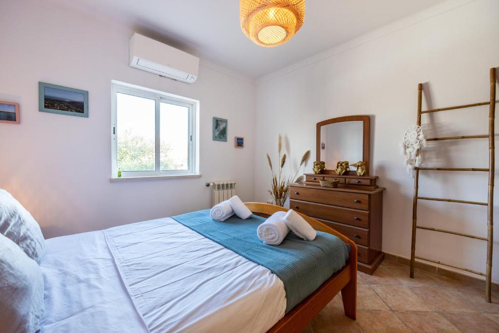 Postel nebo postele na pokoji v ubytování Casa Monkey Business