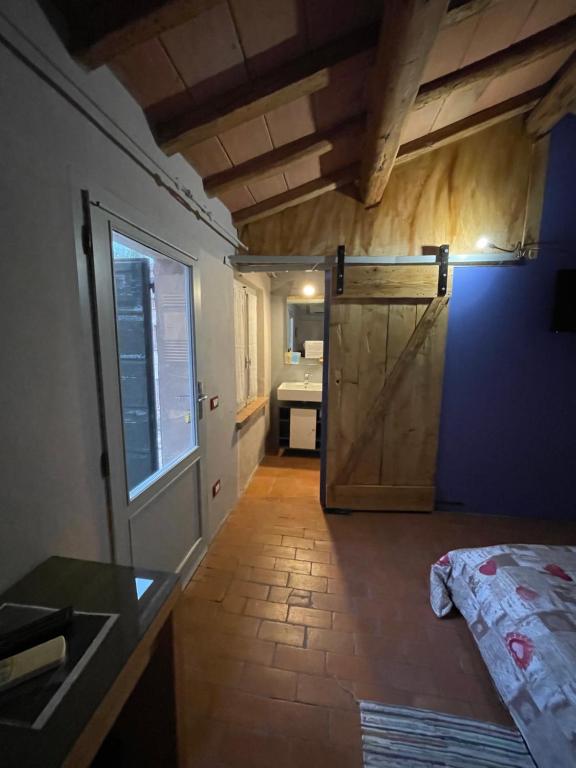 Postel nebo postele na pokoji v ubytování Agriturismo Albero del Latte