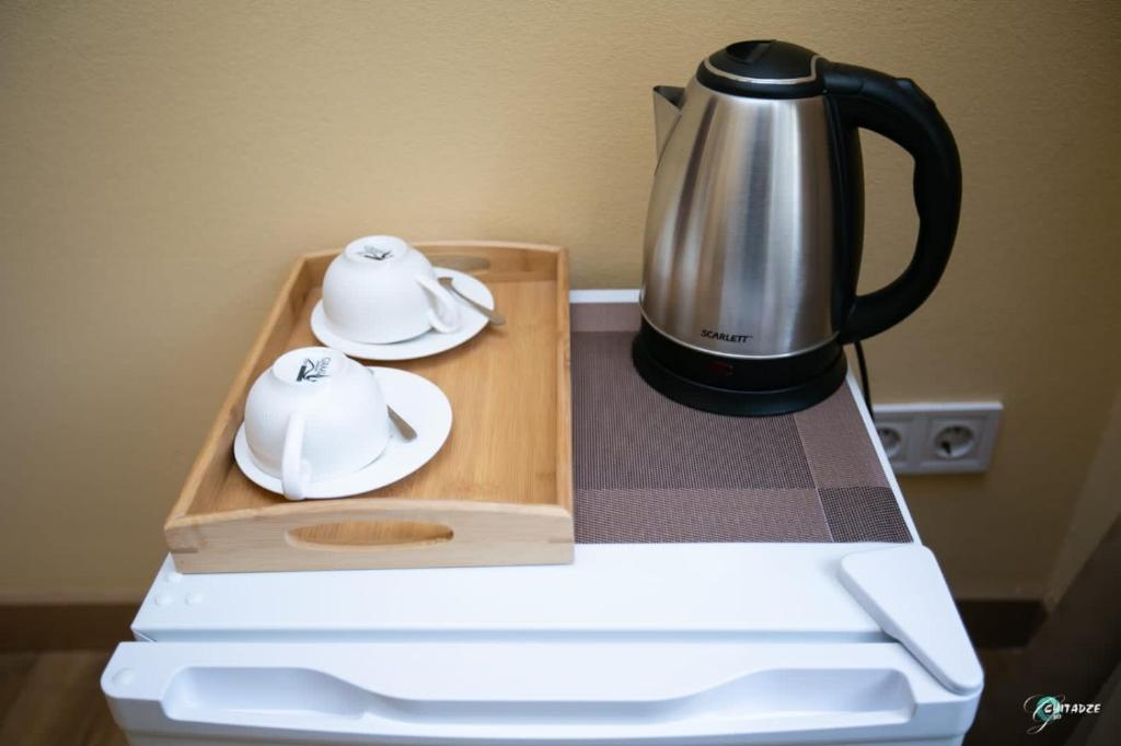 Příslušenství pro přípravu čaje a kávy v ubytování Hotel Middleton