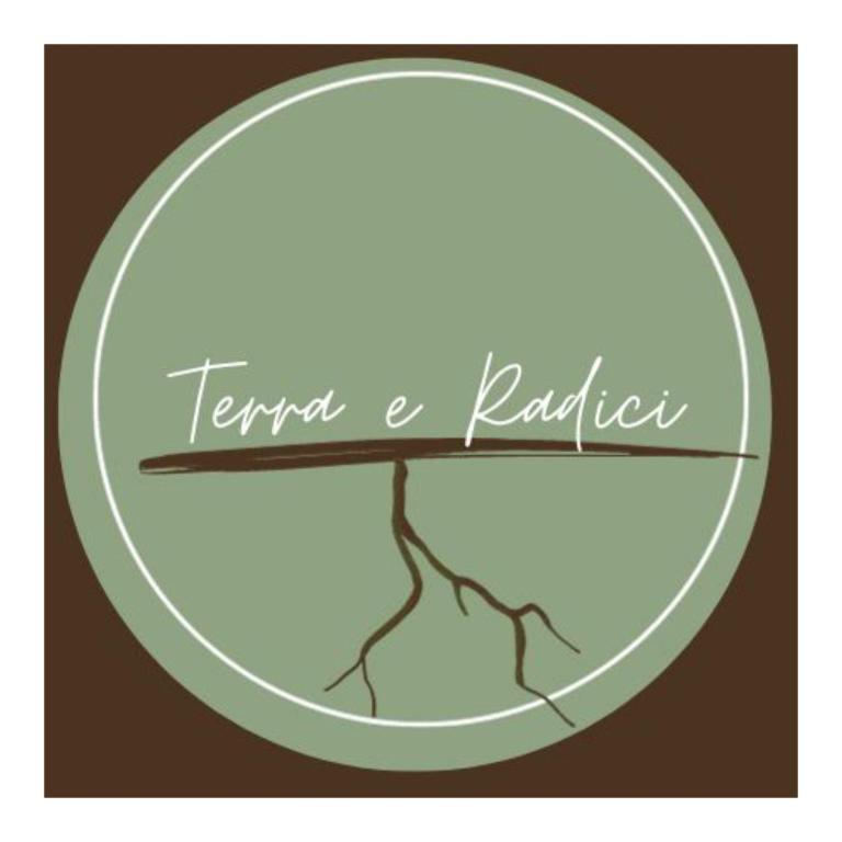 a branch in a circle with the text lend a ladder at Terra e Radici_ Betula in Spriana