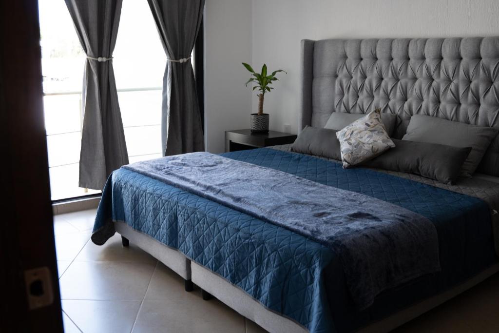 Ένα ή περισσότερα κρεβάτια σε δωμάτιο στο La casita de la Bici