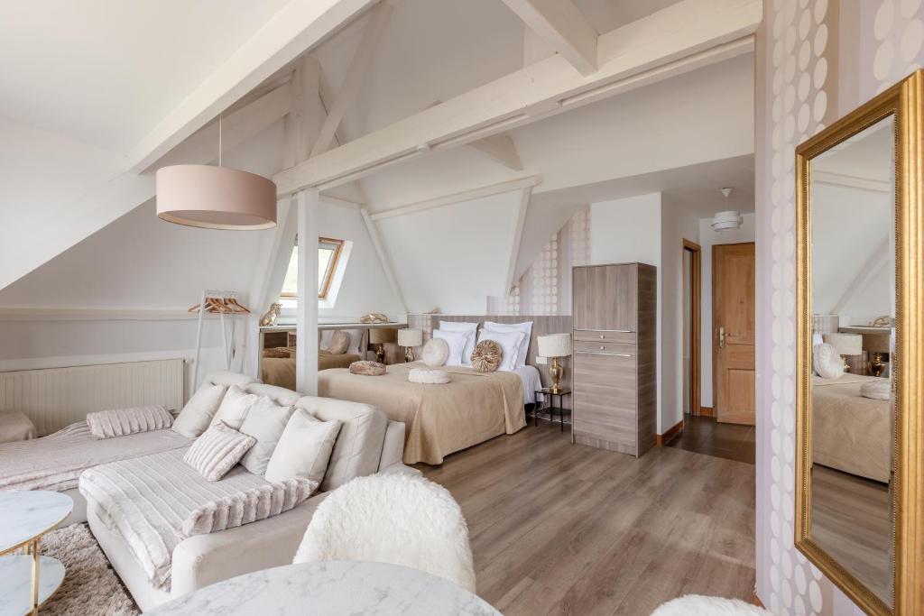 Cama ou camas em um quarto em Domaine du Grand Bec