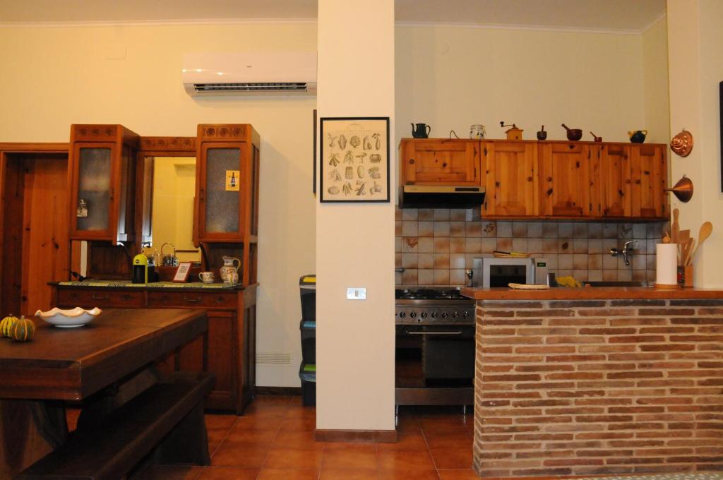 Kuchyň nebo kuchyňský kout v ubytování Rustico Via del Sole 13