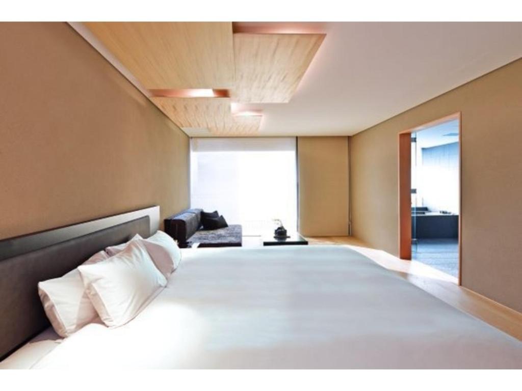 Katil atau katil-katil dalam bilik di MOGANA - Vacation STAY 21178v