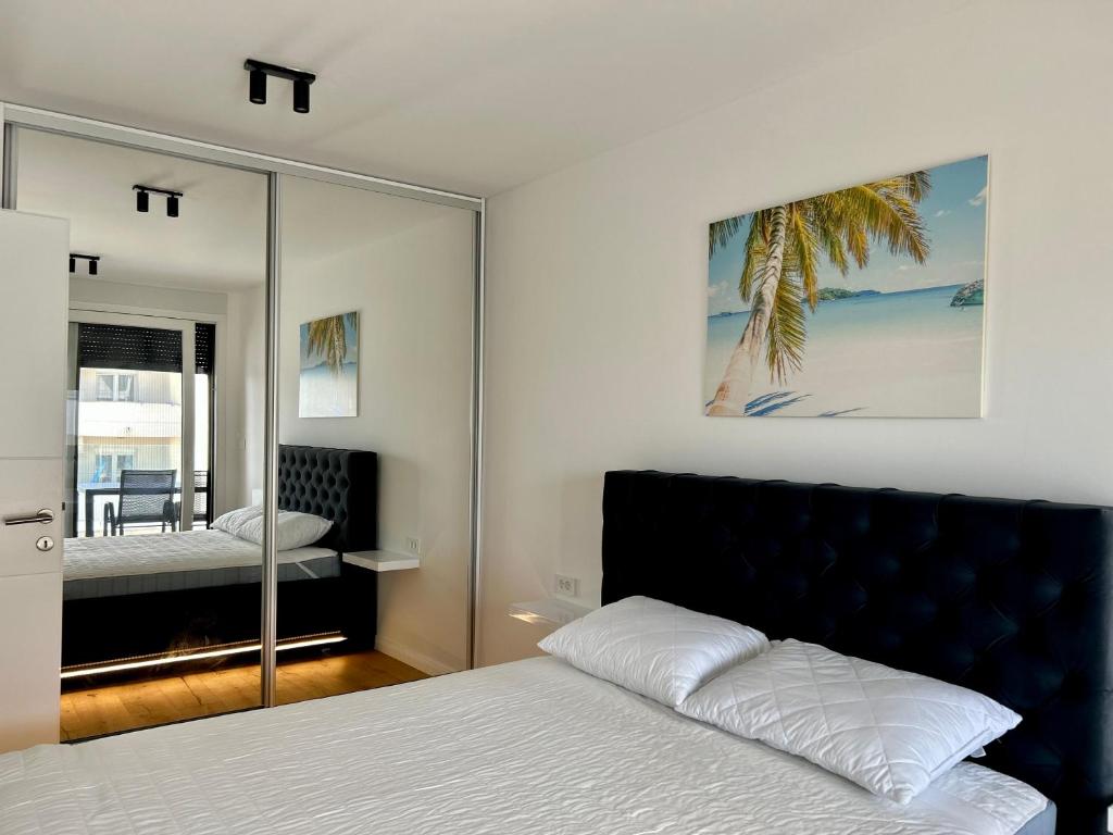 Krevet ili kreveti u jedinici u objektu Palm Beach Apartment, Povljana