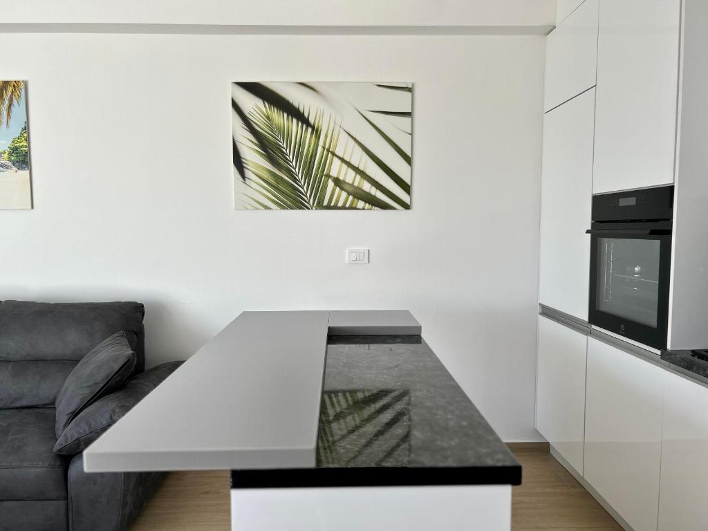 Kuchyň nebo kuchyňský kout v ubytování Palm Beach Apartment, Povljana