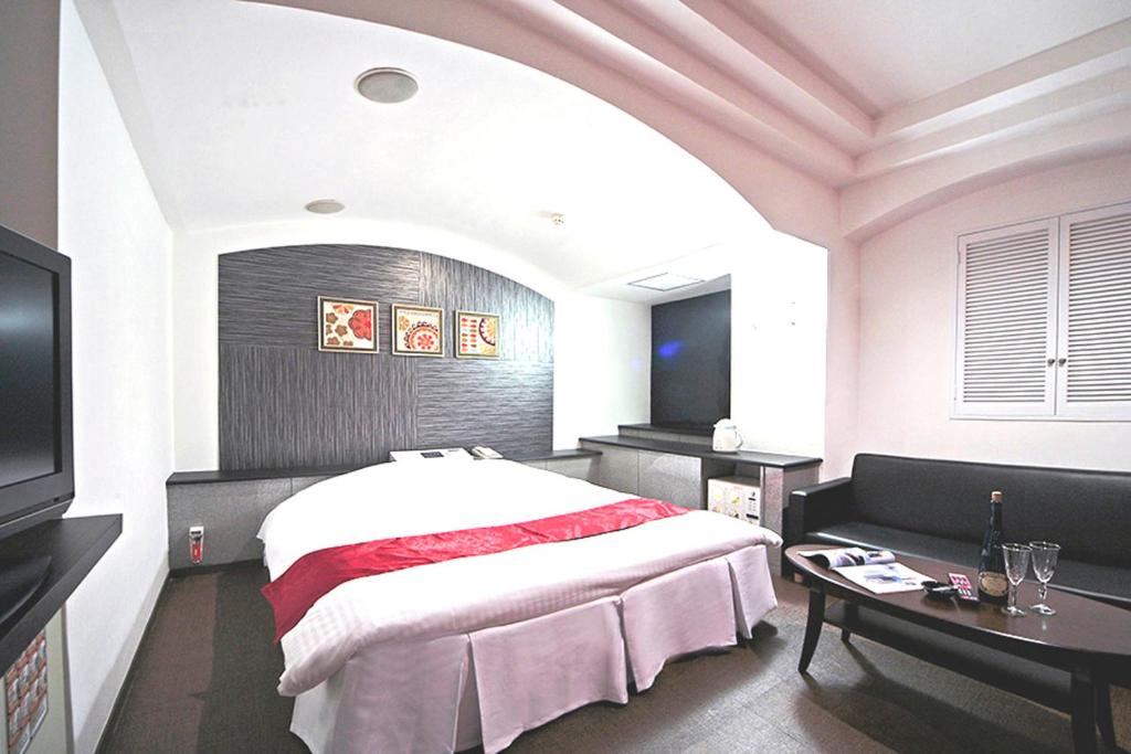 Postel nebo postele na pokoji v ubytování Hotel LALA minato - Adult Only