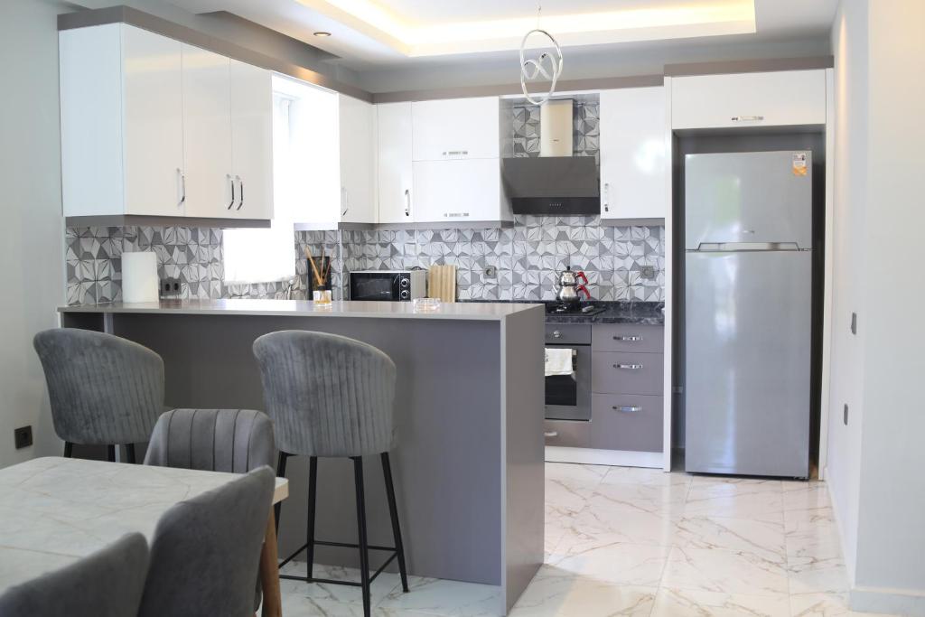 Kuchyň nebo kuchyňský kout v ubytování Bliss Villa