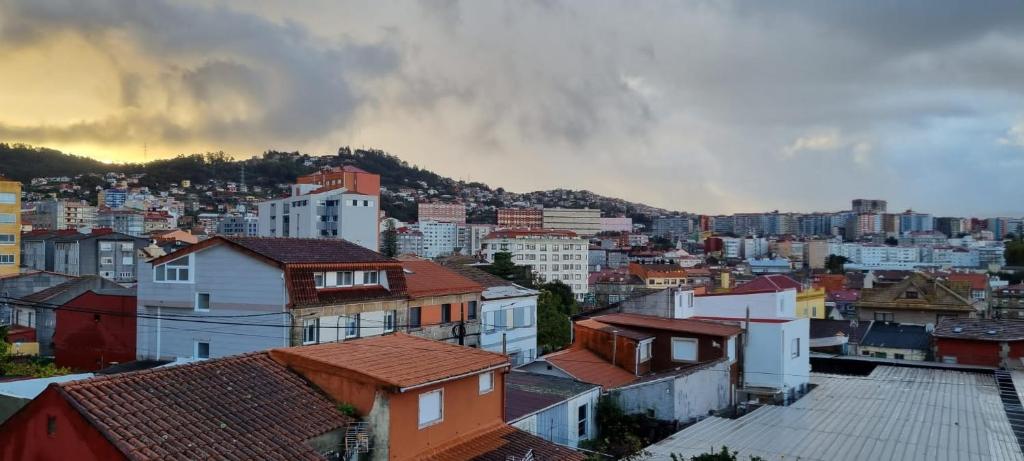 a view of a city with houses and buildings at Loft Teis in Vigo