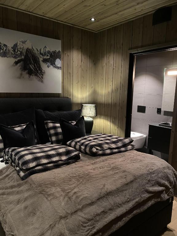 Postel nebo postele na pokoji v ubytování Kikut Alpin Lodge Ski in - Ski out