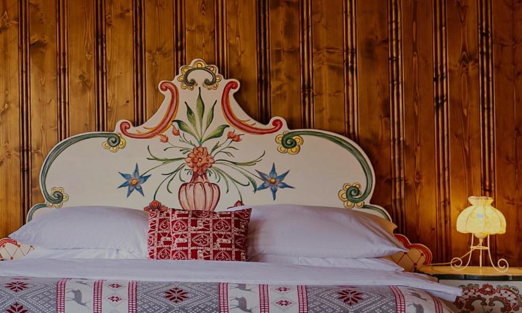 Postel nebo postele na pokoji v ubytování Hotel Křížový vrch