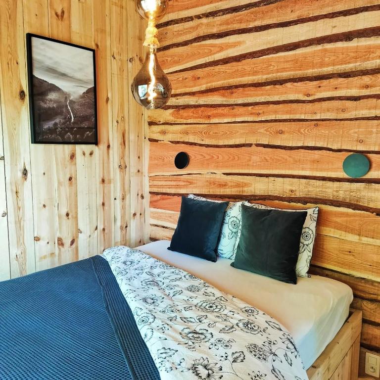 Postel nebo postele na pokoji v ubytování La Cabane d'Ode